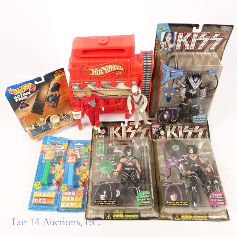 Vintage & NIP KISS, PEZ & Evel Knievel (8): Vintage & NIP KISS, PEZ & Evel Knievel (8). Collection of New In Package and vintage toys. 2 Evel Knievels with red and white clothing (red right arm broken). Hot Wheels JPL Returns to Mars Action Pac