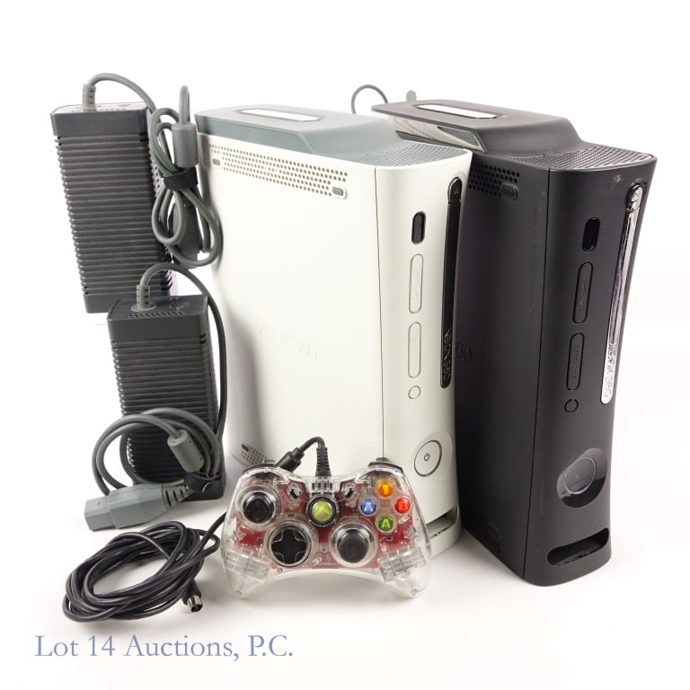 XBox 360 Consoles T+W* (2): Black XBox 360 console 120GB HDD with Wi-Fi adapter and white XBox 360 console 20GB HDD. PDP Afterglow wired controller and two (2) AC adapters included. Tested and working per consigner. *Cables
