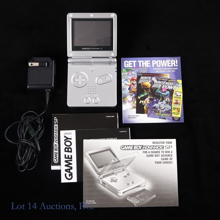 Nintendo Game Boy Advance SP Complete In Box (T+W): Silver Nintendo Game Boy Advance SP with original charger and manuals in original box. Tested and working.