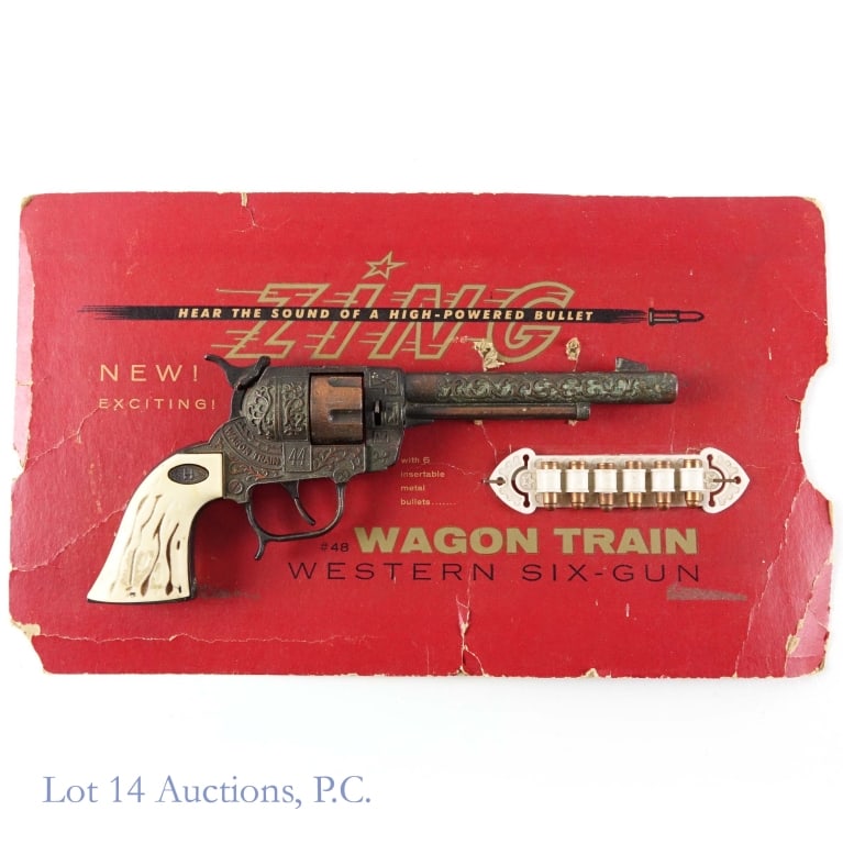 1950s Wagon Train Western Six-Gun Cap Gun Set: 1950s Leslie - Henry Wagon Train Western Six-Gun cap gun set. Bronze finish die cast revolver with six (6) insertable metal bullets and original cardboard backing.