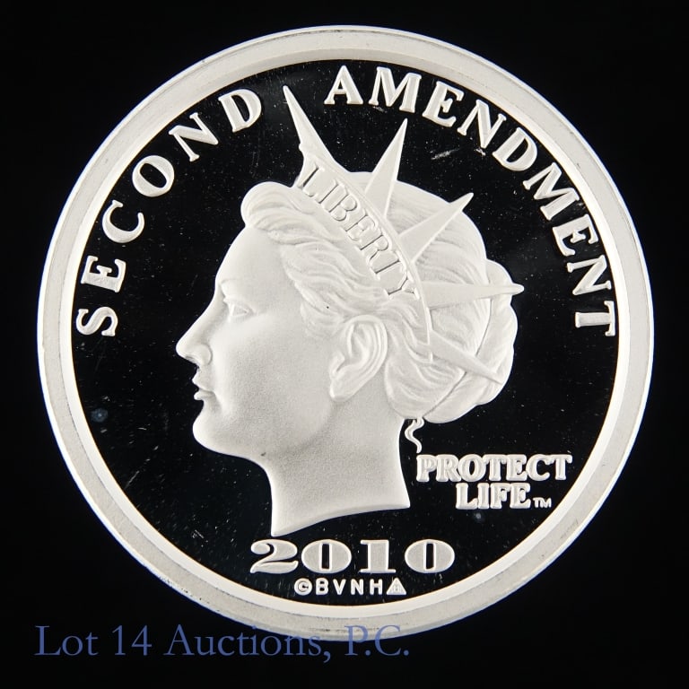 2010 US 2nd Amendment 99.9%-Silver 1 Ozt. Round: 2010 United States $50 gun dollars second amendment: protect life silver round (Bud's Gun shop.com). Metal is 99.9% silver and weighs one troy ounce. Silver content confirmed on Lot 14 Auctions electr