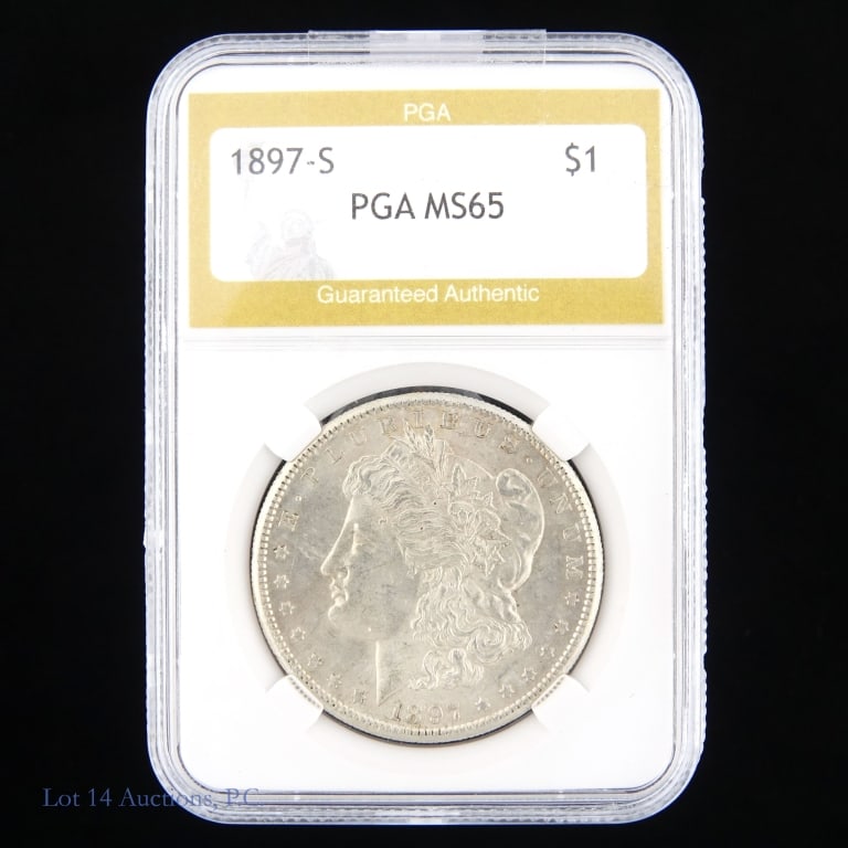 1897-S US Silver Morgan Dollar (PGA): 1897-S United States silver Morgan dollar (San Francisco Mint). PGA slabbed MS 65. Metal is 90% silver. Mintage 5,825,000. Silver content confirmed on Lot 14 Auctions electronic metal verifier. Greysh