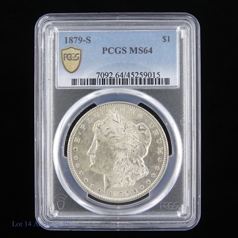 1879-S Silver Morgan Dollar (PCGS MS64): 1879-S United States silver Morgan dollar (San Francisco Mint). PCGS graded MS-64. Metal is 90% silver. Mintage 9,110,000. Greysheet wholesale price guide value at CAC graded MS-64 is $120. ***Lot 14 