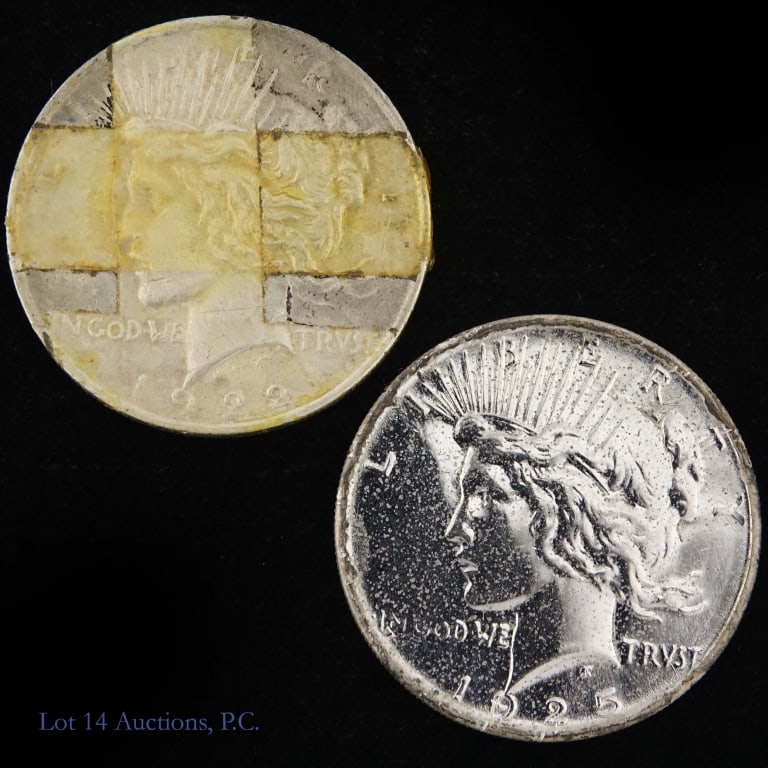 1922d & 1925 US Silver Peace Dollars, 2: Two (2) United States silver peace dollars (Philadelphia, Denver Mints). Metal is 90% silver. Lot estimates ASW is 1.5 troy ounces. Dates as follows: ---1922-D tape marks; and ---1925 polished obverse