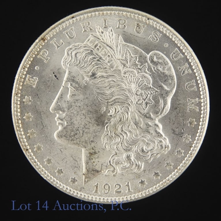 1921 (P) US Silver Morgan Dollar (*BU): 1921 (P) United States silver Morgan dollar (Philadelphia Mint). *Per consigner, with great luster in BU condition. Metal is 90%-silver (lot ASW 0,7734 ozt). *** Lot 14 Auctions is not a professional 