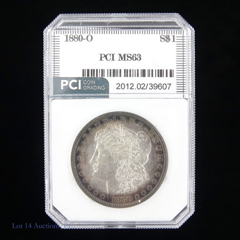 1880-O US Silver Morgan Dollar (PCI): 1880-O United States silver Morgan dollars (New Orleans Mint). PCI slabbed MS63 with toning around obverse edge. Metal is 90% silver. Mintage 5,305,000. Silver content confirmed on Lot 14 Auctions ele