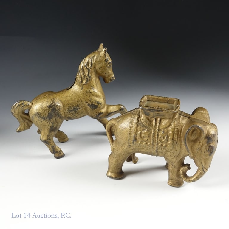 Early 1900s AC Williams Horse Elephant Coin Banks: Early 1900s Prancing Horse and Elephant With Howdah cast iron coin banks by A.C. Williams. Horse measures approximately 4.5" x 4.25", and elephant 4" x 3".