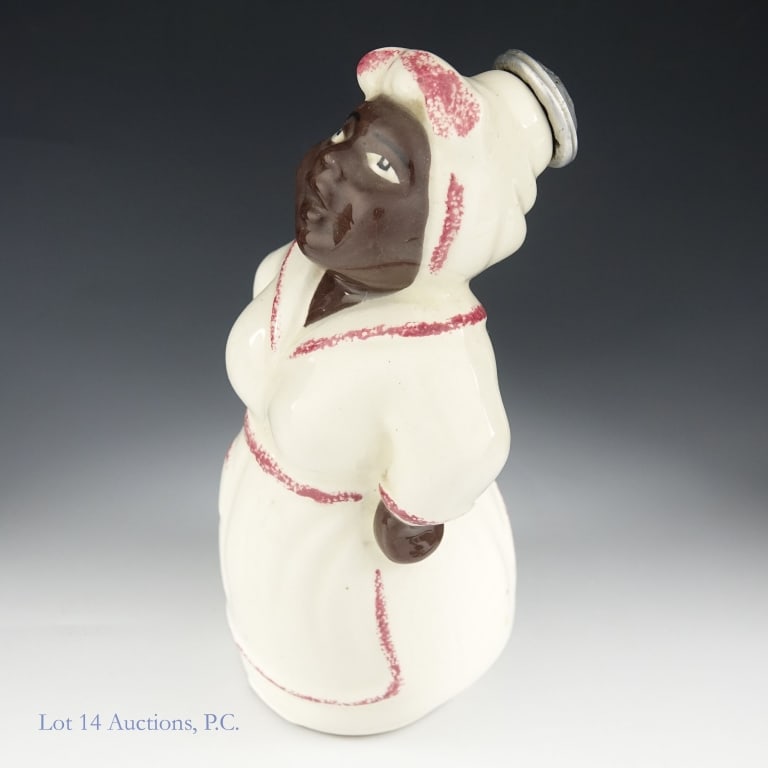 MidCentury Black Americana Mammy Laundry Sprinkler: Mid century Black Americana Mammy ceramic figural laundry sprinkler. Approximately 6.75" tall. Excellent condition.