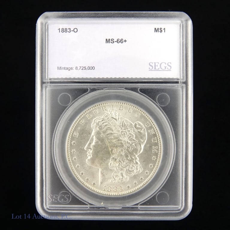 1883-O US Silver Morgan Dollar (SEGS): 1883-O United States silver Morgan dollar (New Orleans Mint). SEGS slabbed MS66+. Metal is 90% silver. Mintage 8,725,000. Silver content confirmed on Lot 14 Auctions electronic metal verifier. ***Lot