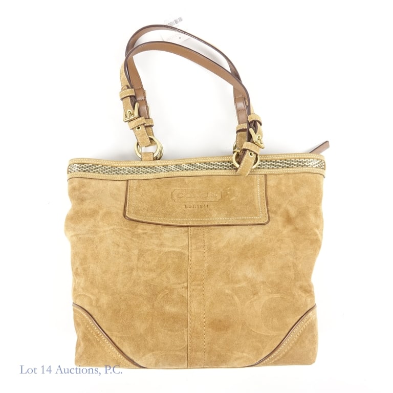 Brand New Coach Hamptons Suede Beaded Tote Bag: Brand new Coach Hamptons Signature Suede Beaded Tote bag. Camel / tan suede with debossed C logo pattern, leather trim, gold tone hardware, and a metallic beaded accent band near the top. Approximatel