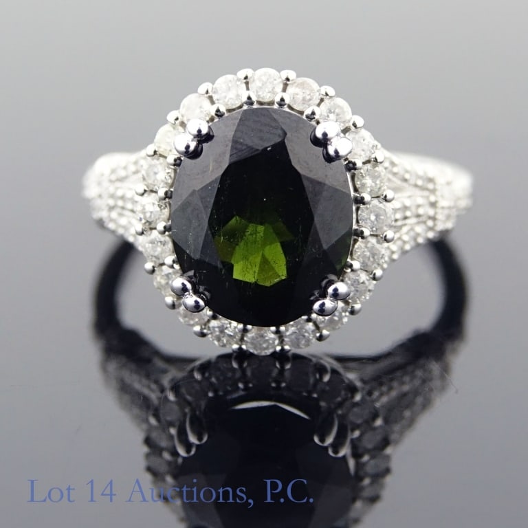 14k White Gold Tourmaline & Diamond Ring: Size 7 dress ring made with 14k white gold, decorated with one tourmaline and sixty four melee diamonds (3.91 ct tourmaline, 0.60 cttw diamonds). Total weight of ring is approximately 5.79g. Identific