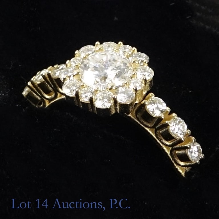 14k Yellow Gold Diamond Engagement Ring w/ ID: Size 6 classic engagement style ring made with 1, decorated with diamonds (0.75 cttw center, 0.65 cttw sidestones). Total weight of ring is approximately 3.14g. Identification and appraisal report