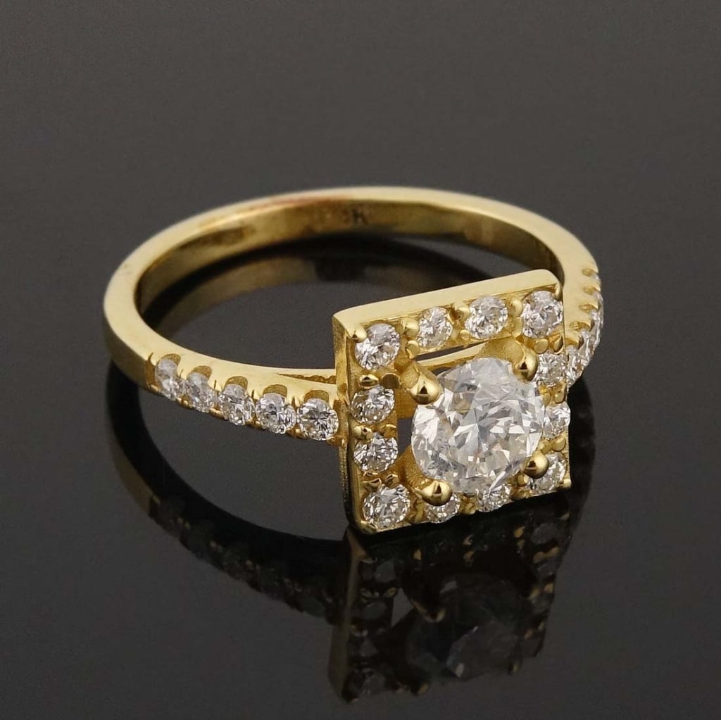 14k Y Gold Diamond Engagement Ring w/ ID: Size 6 STYLE ring made with 14k yellow gold, decorated with diamonds (0.60 cttw center, 0.45 cttw sidestones). Total weight of ring is approximately 2.82g. Identification and appraisal report from