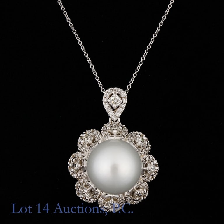 14k White Gold South Sea Pearl & Diamond Necklace: 14k white gold necklace decorated with a large south sea pearl and 95 diamonds (14mm pearl, 3.16 cttw diamonds). Total weight of necklace is approximately 16.9g, and the chain measures approximately 1