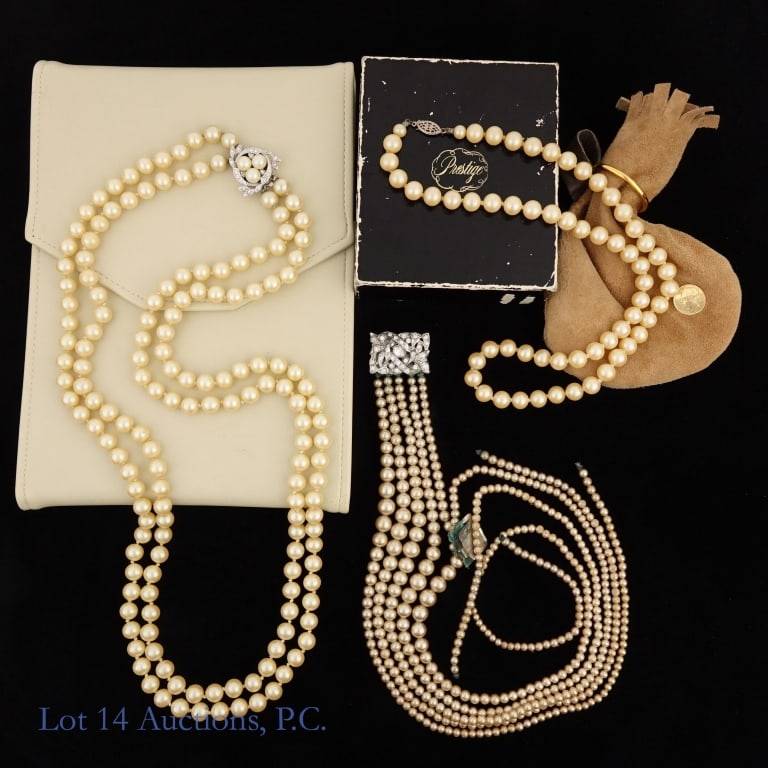 Pearl Necklaces (3): Double strand salt water pearl necklace with pearls and stones decorative clasp, approximately 30" long. White satin protective folder is included **** Single strand salt water pearl necklace with dec