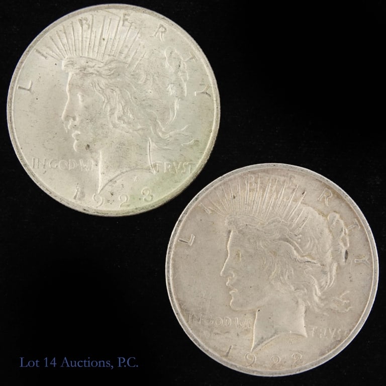 1922 & 1923 US Silver Peace Dollars, 2: 1922 (P) and 1923 (P) United States silver peace dollars (Philadelphia Mint). Metal is 90% silver. Lot estimates ASW is 1.5 troy ounces. Silver content confirmed on Lot 14 Auctions electronic metal ve