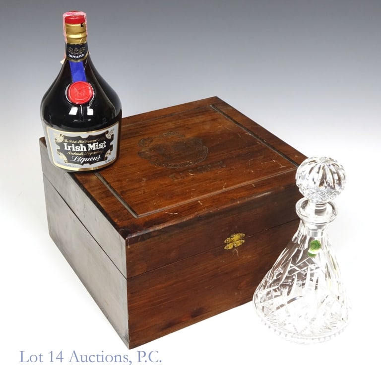 1980s Irish Mist Liqueur & Waterford Decanter Set: Irish Mist gift set includes - Irish Mist Liqueur, 70 Proof, 750ml, '80s tax strip fully intact *** Waterford Lismore Roly Poly crystal decanter with care instructions *** Carved wooden presentation b