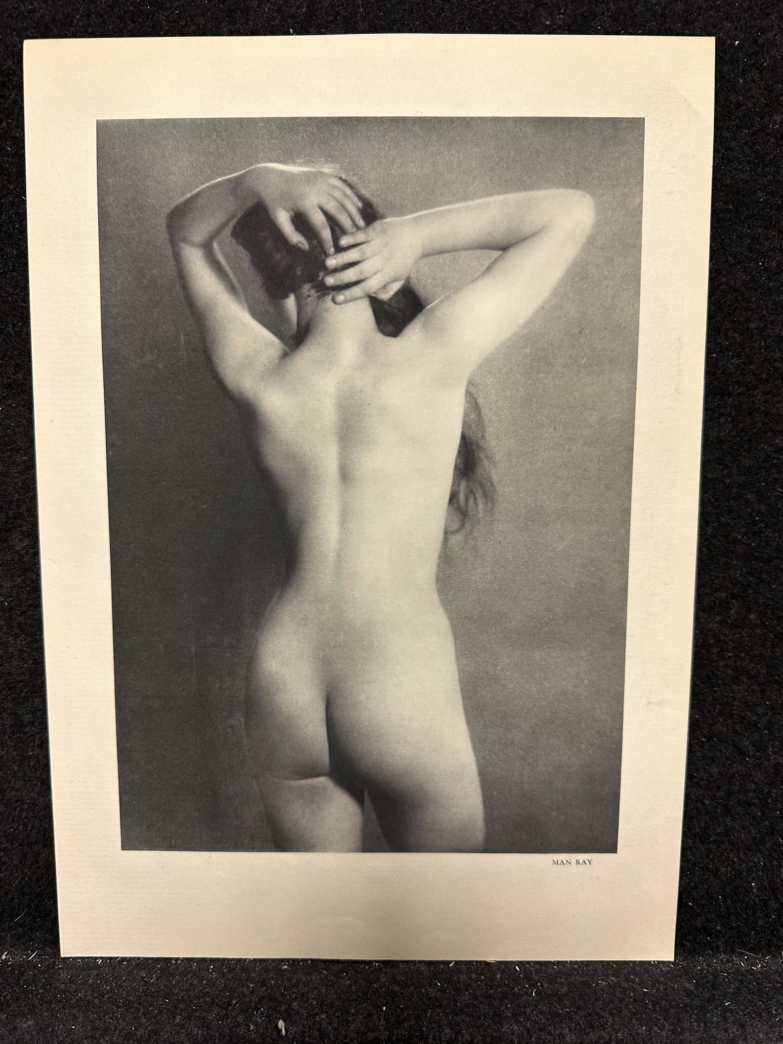 Man Ray (after), photogravure, 1937: Artist: Man Ray (American, 1890-1976) Title: Nude Year: 1937 Medium: photogravure printed photograph Image Size: 11.0 x 7.8 inches Sheet Size: 13.9 x 9.8 inches Catalog reference: