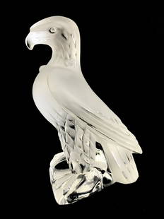 Lalique "Liberty" Eagle French Crystal Sculpture: Lalique France frosted molded crystal "Liberty" eagle sculpture. Crafted from the highest quality of French crystal. Signed to base "Lalique France" in script. Measures: 9.5" Tall x 5.5" Wide. From a