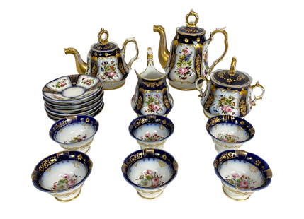 Christie's 16pc Old Paris Cobalt Porcelain Tea Set: Set to include: (1) Teapot, (1) Coffee Pot, (1) Sugar, (1) Creamer, (6) Teacups and (6) saucers. Circa: Early 20th Century. Originally featured at Christie's New York - May 23rd, 2001. Local Pick Up