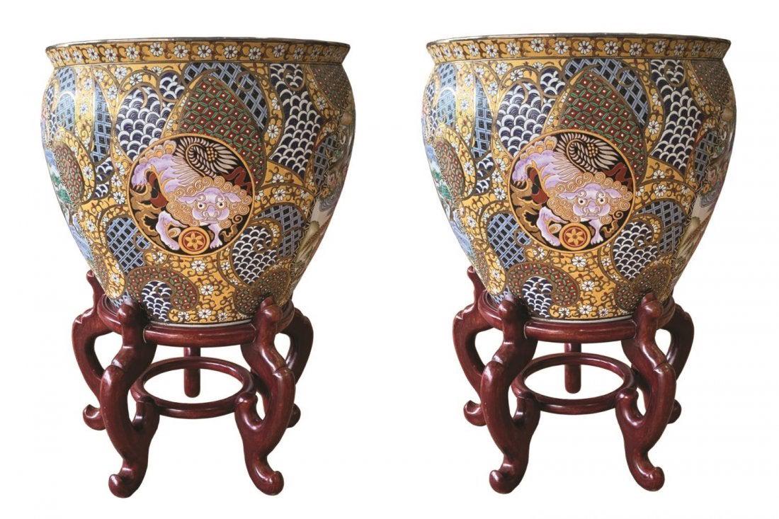 Chinese Foo Dog Porcelain Garden Planters w/Stands: Pair of Chinese hand painted planters atop wooden stands decorated with foo dog motifs famille rose scenes, floral borders & reticulated koi fish design to interior. Each measures approx. 29-1/2" H x 
