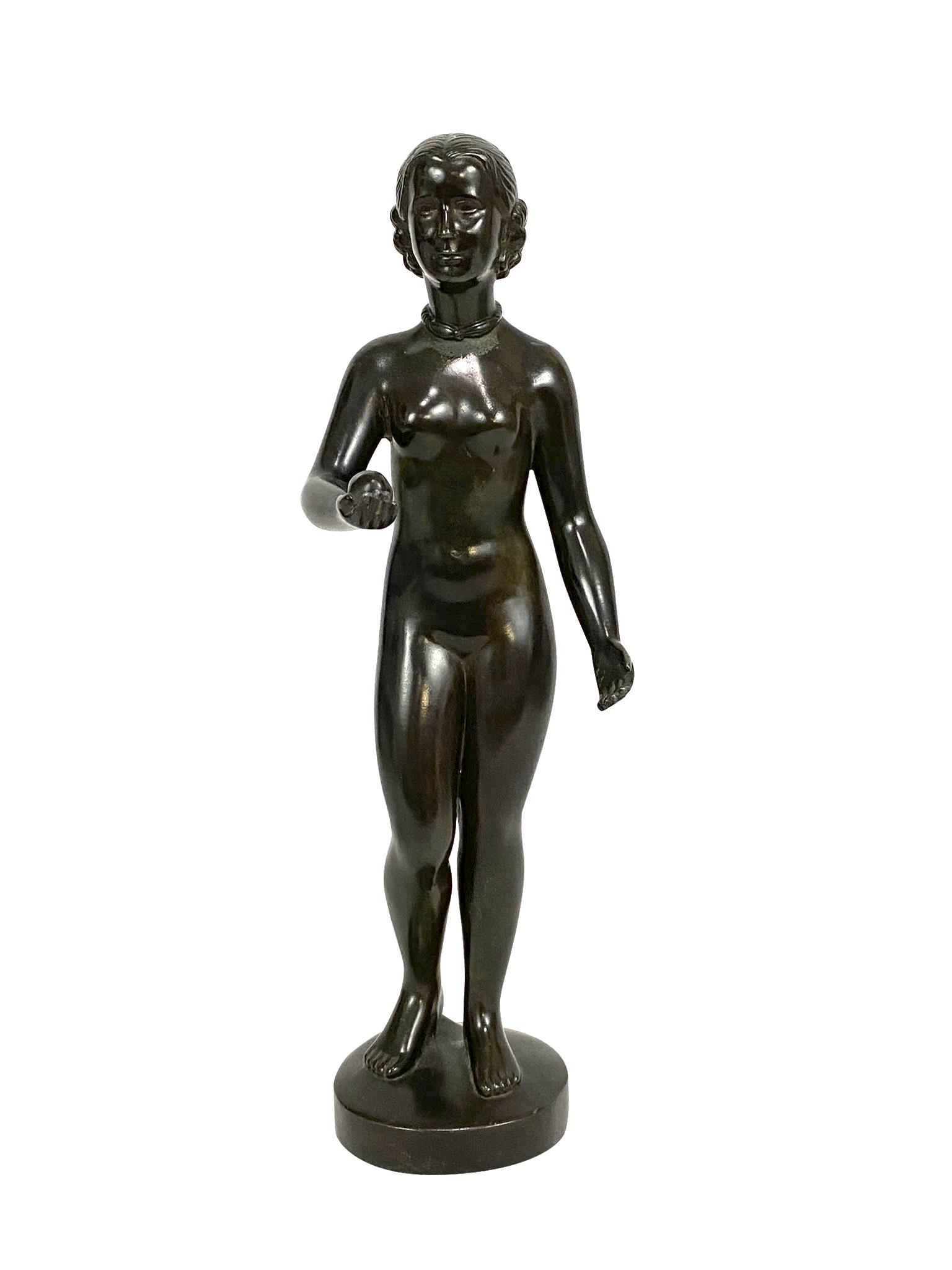 Just Andersen Female Nude Art Deco Bronze Sculpture: Just Andersen (Denmark: 1884 - 1943) original Art Deco, Danish bronze, sculpture of a female nude figure holding an apple/fruit. Signed in script to base. Measures approx. 11-1/2" Tall x 4" Wide. Tota