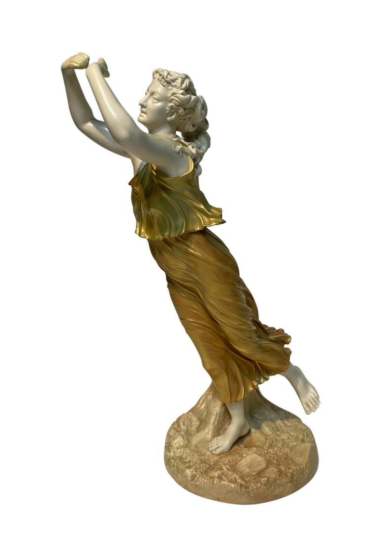 Royal Worcester Art Nouveau Hadley Figure: Antique, 19th century, Royal Worcester porcelain sculpture of a Nouveau woman in gilt dress. Inscribed "Hadley" to exterior of base. Bears green Worcester mark under base. Measures: 22-1/2" Tall x 9" 