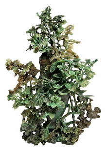 Chinese Hand Carved Jade Grouping Vase: Chinese hand carved jade figural grouping vase with cover. Featuring birds perched in branches and leaves chasing crickets. Measures:12-3/8" L x 4" W x 16-1/4" H. Provenance: Private Collection: Ft.