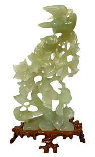 Chinese Hand Carved Jade Bird Group w/ Stand: Chinese hand carved jade bird group sculpture seated atop a fitted wooden stand. Circa: 20th Century. Dimensions: 6” W x 10” H (Jade) + 7” L x 4” W x 1-1/2” H (Base). Provenance: Private