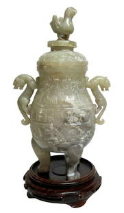 Chinese Jade Carved Footed Vessel w/ Stand: Antique Chinese hand carved shoushon bi-disc on metal stand. Measures: 11-5/8" Diameter. Measures: 16-1/2" Tall with stand. Provenance: Private Collection: Ft. Lauderdale, FL. Shipping: Purchaser