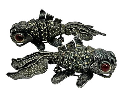 Pair of Sterling Silver & Marcasite Koi Fish Pins: Pair of sterling silver & marcasite mechanical koi fish pins. Dimensions: 3-1/8” L x 1-5/8” W x 1-1/4” H (Each). Total Weight: 81.51 grams. Provenance: Private Collection: Boca Raton, FL 