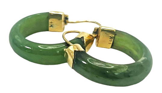 14kt Yellow Gold Jade 1” Hoop Earrings: Pair of 14 karat yellow gold and green jade hoop earrings. Marked 14K. Each measures approx. 1" Long. Provenance: Private Collection: Boca Raton, FL Shipping: Purchaser local pick-up by