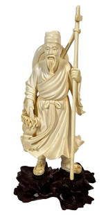 Antique Chinese Hand Carved Bone Fisherman Figure: Antique Chinese hand carved bone figure of a fisherman with spear and hat atop a fitted wooden base. Measures: 8-7/8" H x 4" W x 3" D. Provenance: Private Collection: Palm Beach, FL. Shipping: