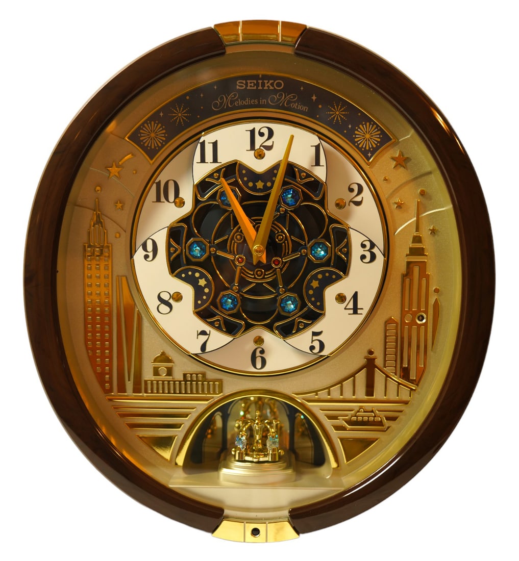 Seiko musical motion wall clock 30 songs swarovski crystals rotating pendulum store