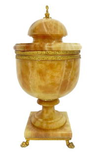 Antique French Onyx Carved Dolphin Compote: Antique French art deco hand carved onyx and gilt bronze hinged covered compote. Gorgeous, polished stone accented with scrollwork trim trim/lid, dolphin figural finial and footed bass. Dimensions: 6"