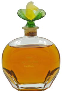 Leopoldo Gourmel "Age du Fruit" Cognac: Leopoldo Gourmel "Age du Fruit" sealed cognac bottle with green pate de verre crystal horse head stopper. Bottle: 8" H x 6" L x 3" W. Provenance - Private Estate Collection: Palm Beach, FL. 