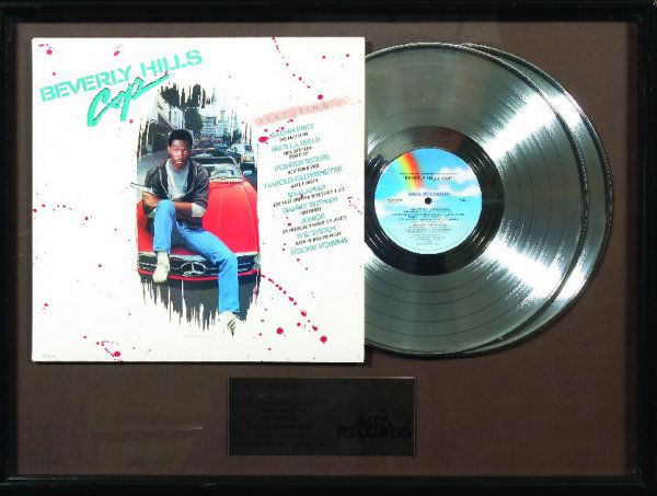 15* "Beverly Hills Cop" MCA Platinum award: Presented to Carry Mansfield for sales of over two million copies of the soundtrack album. Framed and glazed. SOLD WITHOUT RESERVE