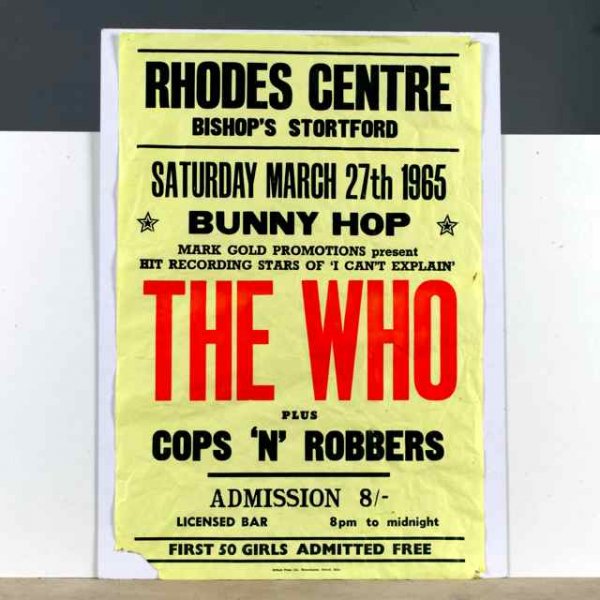 The WHO a boxing Style Poster: Who A boxing style poster advertising The Who and Cops and Robbers Saturday March 27th 1965 at The Rhodes Centre Bishops Stortford. 19 3/4 x 29 1/2 inches Framed This is the promoter's personal after 