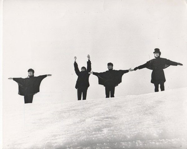 Beatles Help Photo Bt Robert Freeman: Original iconic Press Photo of the Beatles during the filming of "Help" in Austria 1965 with stamps for Camera Press and Len Sirman Press, original byeline and Credit to Bob (Robert) Freeman who was r