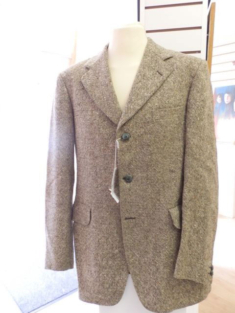 Buddy Holly's Jacket and Family letter: Buddy Holly's A stage worn Donegal Tweed grey wool jacket once owned by the legendary Buddy Holly originally auctioned as part of the Dick Clark 'Rock n Roll Circus auction' organised by the Fame Bure
