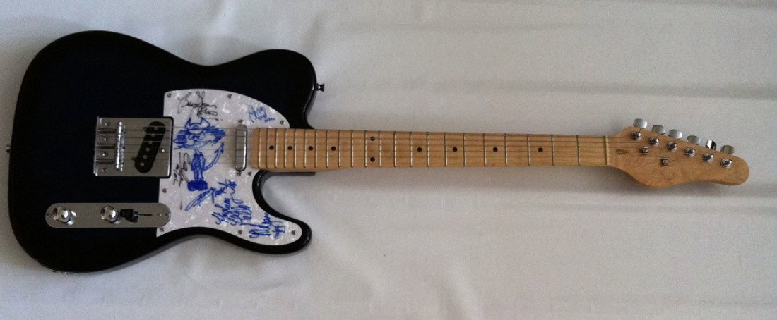 AC/DC FULLY SIGNED GUITAR: AC/DC guitar (reserve £250) The guitar signed by: BRIAN JOHNSON ANGUS YOUNG MALCOLM YOUNG CLIFF WILLIAMS PHIL RUDD The AC/DC authentic signed guitar is a fully working electric guitar, which is autog
