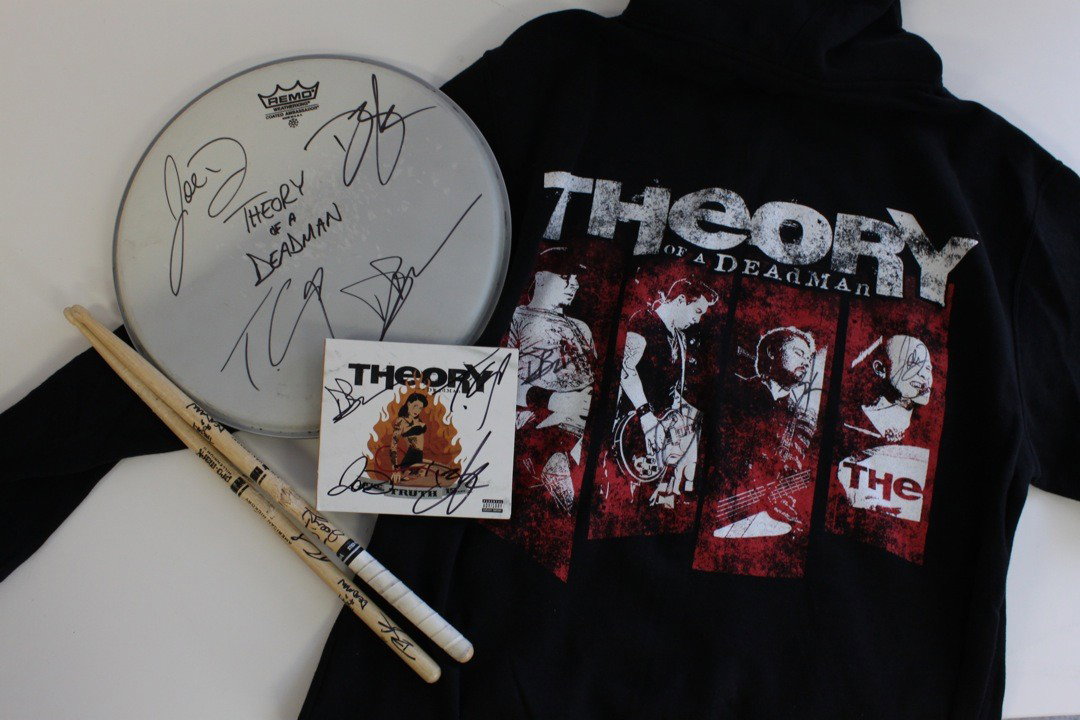 Theory Of A Deadman - Signed BUNDLE MAJ LOT : Theory Of A Deadman - Signed Hoodie, Drumhead, CD, and Drumsticks Vancouver, Canada's Theory of a Deadman became the first act to sign with Nickelback frontman Chad Kroeger's 604 Records imprint in 20