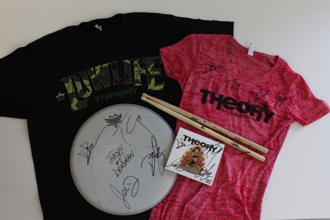 Theory Of A Deadman - Signed BUNDLE MAJ LOT: Theory Of A Deadman - Signed Men’s Shirt, Ladie’s Shirt, Drumhead, CD, and Drumsticks Vancouver, Canada's Theory of a Deadman became the first act to sign with Nickelback frontman Chad Kroeger's 6
