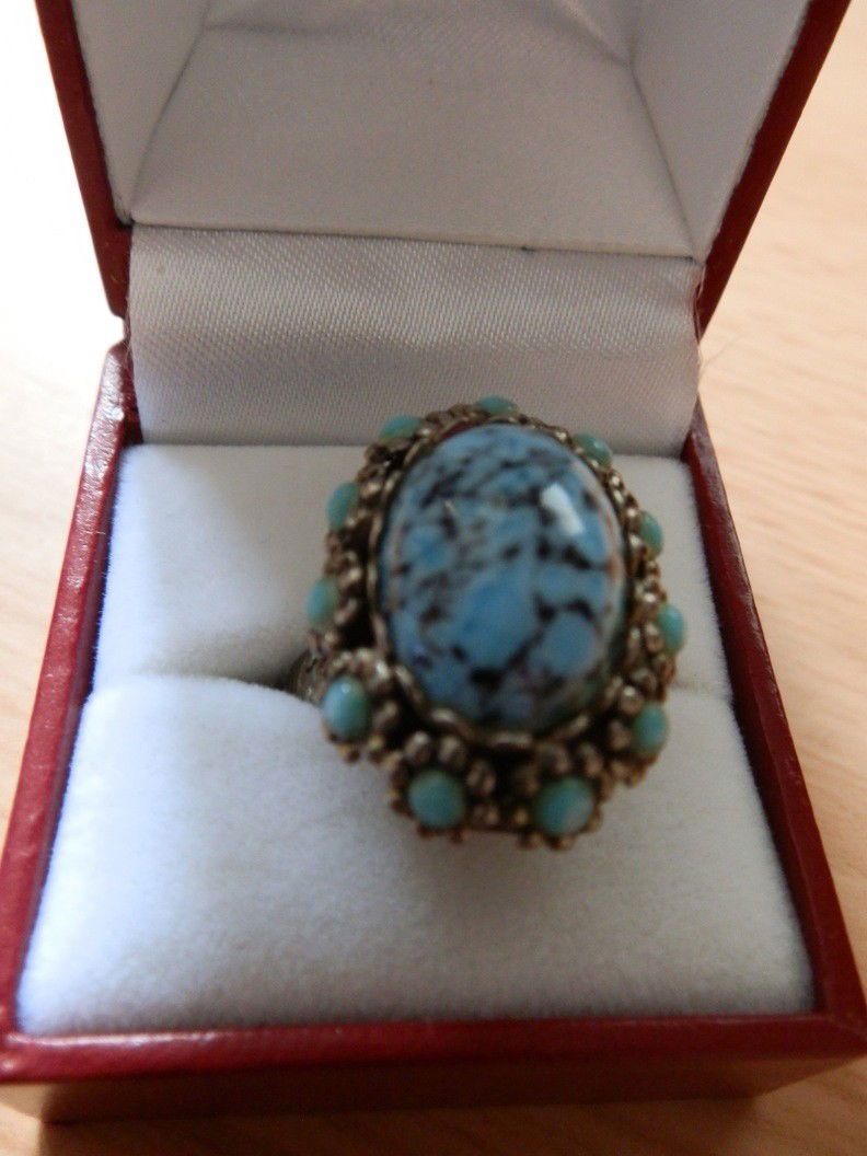 Jimi Hendrix Owned Dress Ring: A faux turquise chrome dress ring owned by Jimi Hendrix circa 67-68 and given to the wife of one of his management team. With a letter of authenticity.