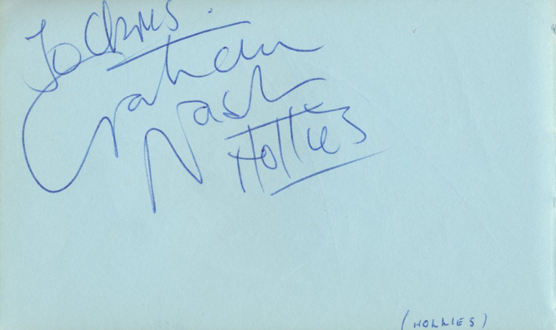 Graham Nash Autograph: Graham Nash Signed in blue ink. These autographs are album pages from autograph books. Approximately 4 1/2 x 5 1/2’’ in size unless stated. Any further questions please refer to the department