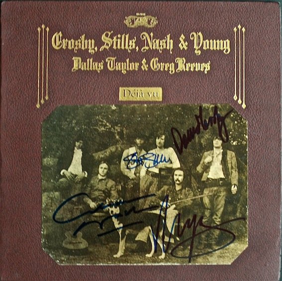 Crosby, Stills, Nash & Young autographed ‘Deja Vu’ LP: Crosby, Stills, Nash & Young autographed ‘Deja Vu’ LP. Signed by David Crosby, Steven Stills, Graham Nash & Neil Young in blue sharpie. Includes record