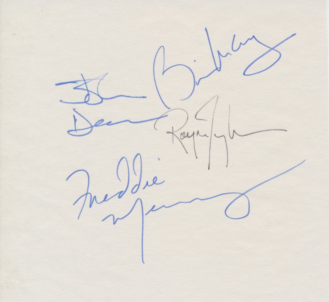 Queen autographed album page: Queen autographed album page. Freddie Mercury, Brian May and John Deacon signed in blue pen & Roger Taylor signed in black pen. Includes two unpublished con- cert photographs. In excellent condition