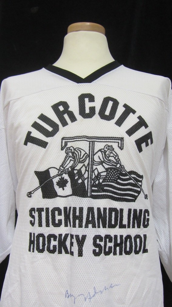 Brian Adams signed Hockey top: Brian Adams. An Autographed ‘Turcotte’ Hockey School training top/jersey. Signed by Brian Adams in black sharpie