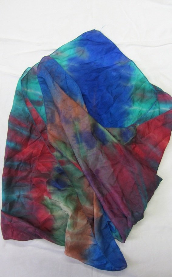 Jimi Hendrix. A rainbow scarf: Jimi Hendrix. A rainbow scarf. A multi colored silk scarf owned and worn by Jimi Hendrix. Given to the wife of one of the major managers working at the time in Newcastle UK.. With a letter of Authenti