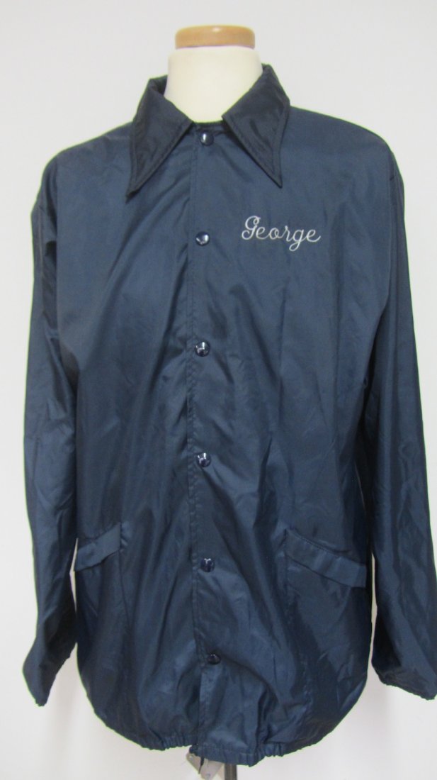 George Harrison Beatles crew wind cheater: George Harrison/Beatles A blue nylon cotton lined wind cheater Beatles crew jacket with embroidered George on the left shoulder worn by George Harrison Circa 1967